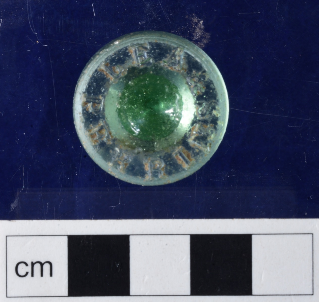 IMAGE 1 – front view of lea & perrins’ glass bottle stopper that was located on the surface curtis park, armidale, nsw, march 2020 (m. zarb).