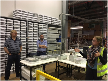 Research assistant bronwyn woff explaining the historical archaeology collection